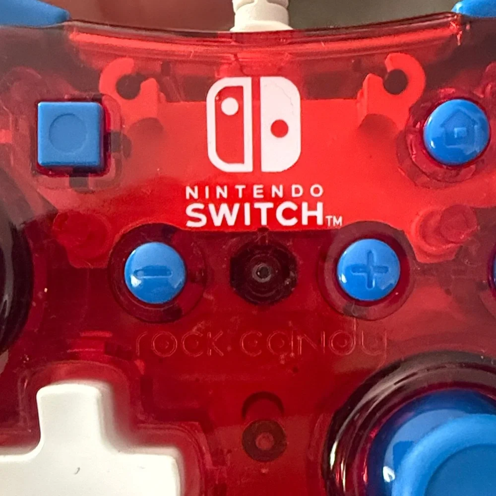 Nintendo Switch Red and Blue Controller with Mario Graphic